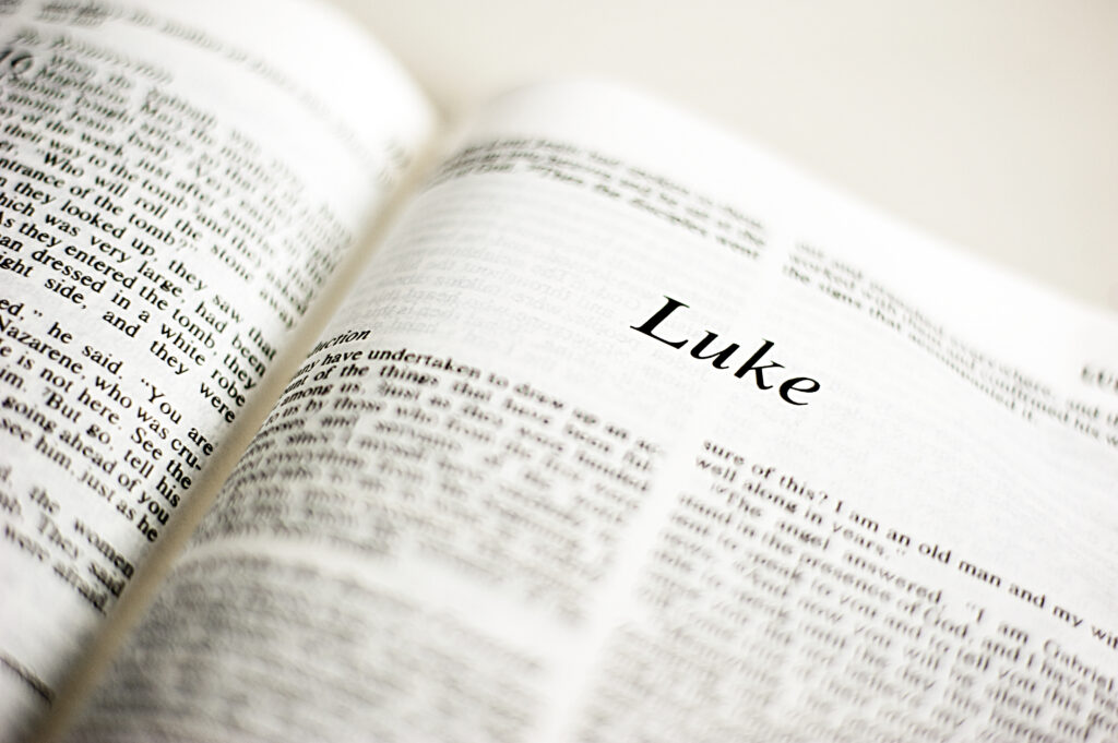 A bible open to the book Luke.