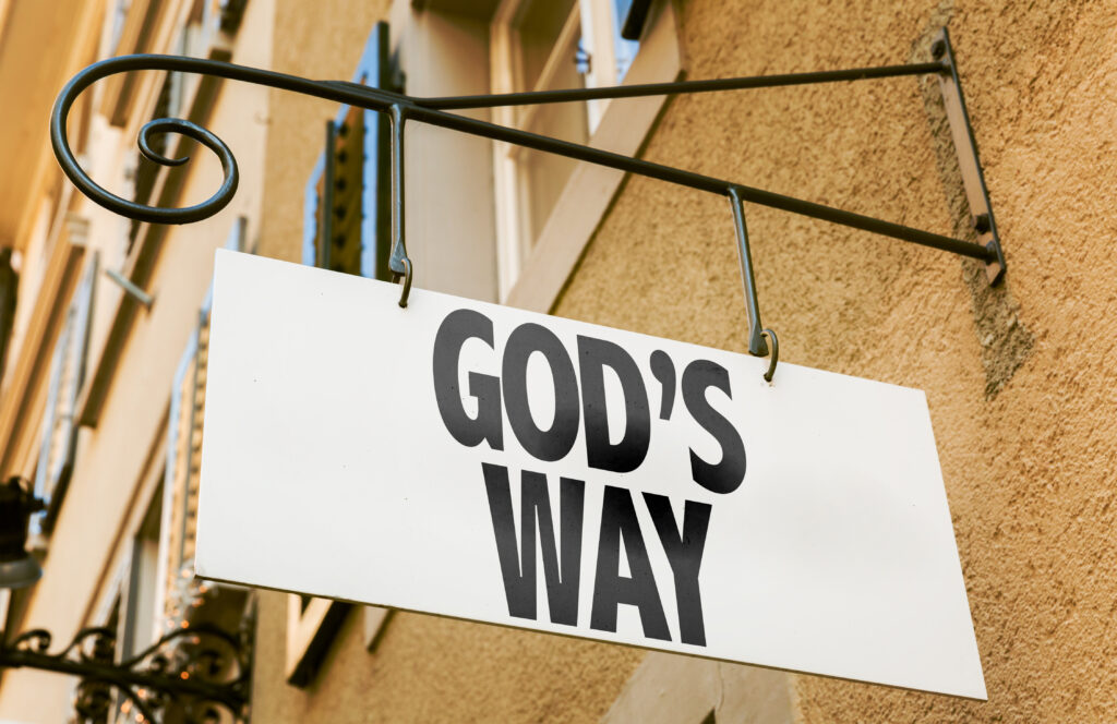 Hanging shop sign displaying the words God’s way.