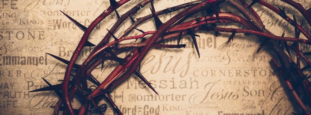 Crown of thorns with Jesus names and attributes in the background.