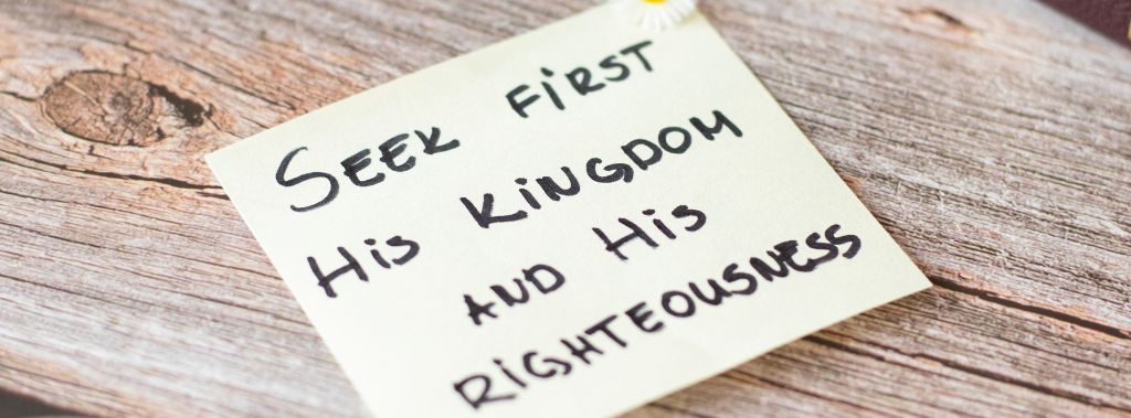Note next to a Bible that says “Seek first His kingdom and His righteousness.”