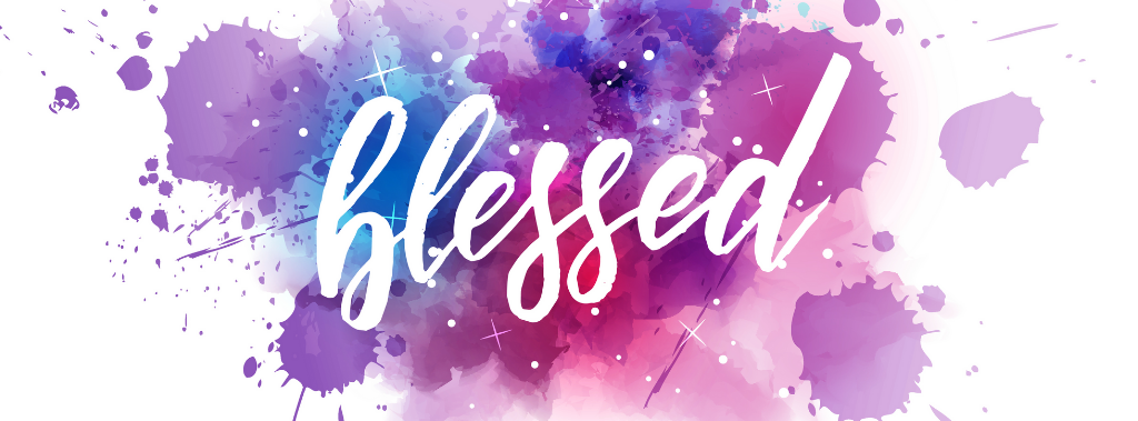 Cursive "blessed" in pink, blue, and purple paint splatters