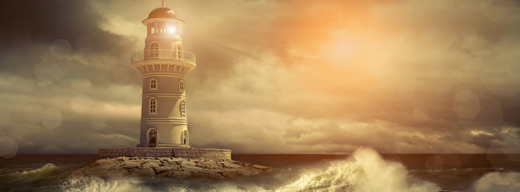 A lighthouse on the sea with sun behind the clouds, representing how hope shines in the darkness.  