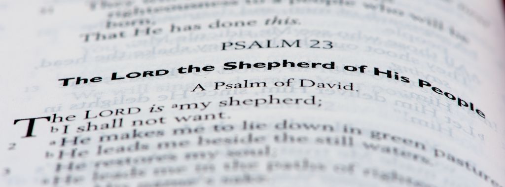 Close-up of Psalm 23 in the Bible, representing how we are meant to rest in Him.

