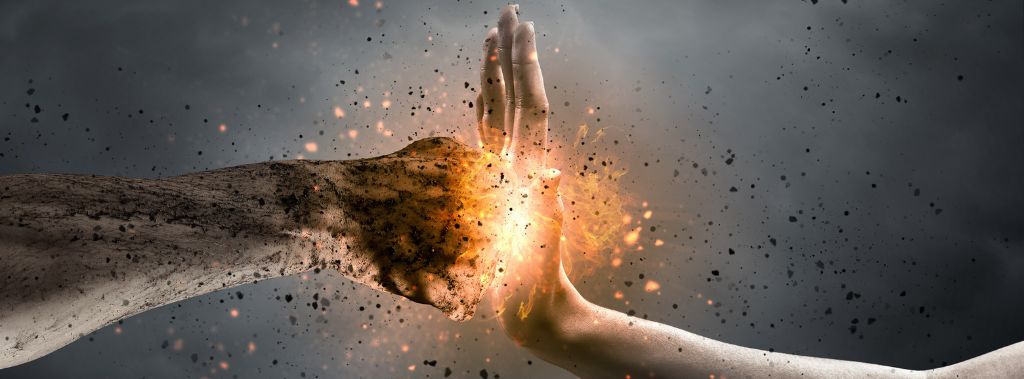 An open palm colliding with a fist, creating an explosion on the palm - Symbolism for “discerning of Spirits.”