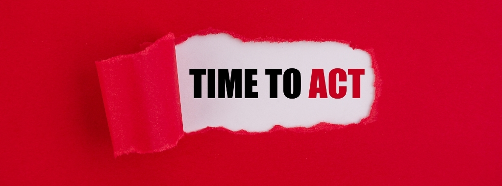 Red paper being torn away to reveal the words "time to act"