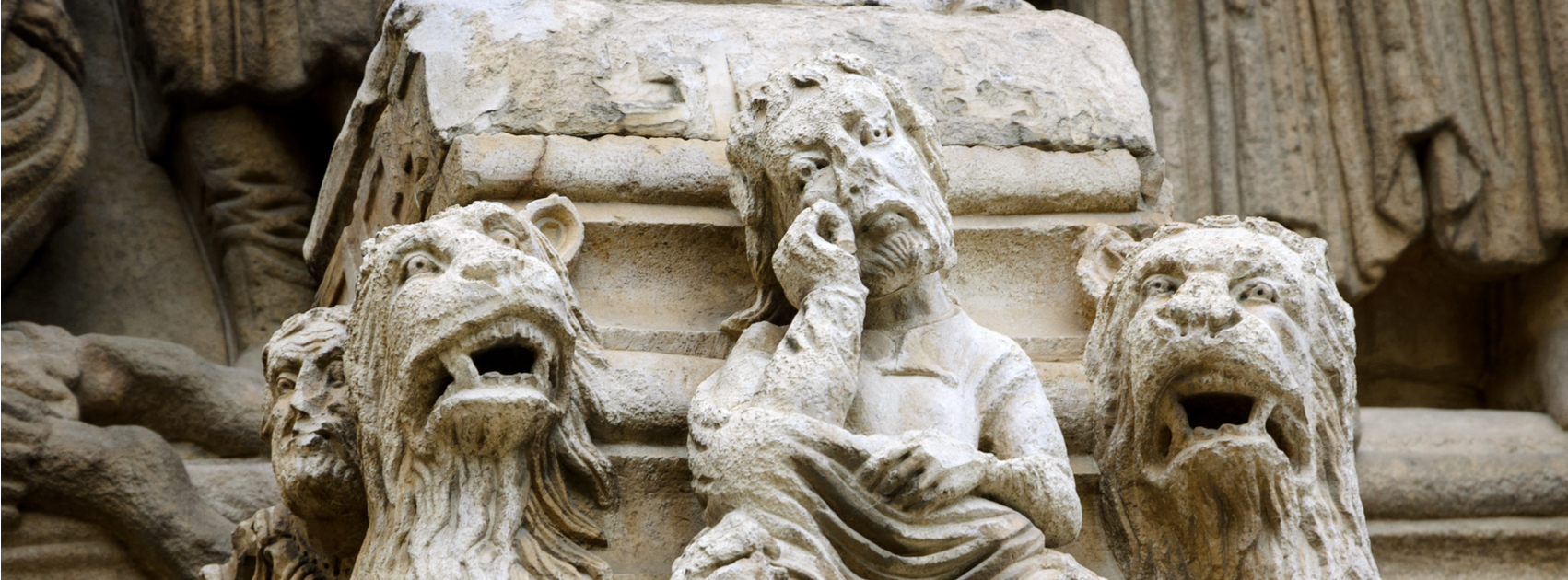 Daniel in the lions' den. Architectural detail. Facade of the church of St. Trophime in Arles. (Provence, France)